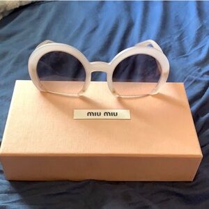 Miu Miu Translucent Pink Round Sunglasses